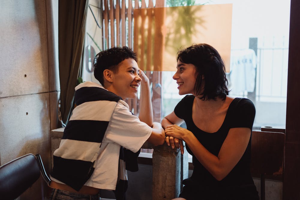 Two people in warm, open conversation